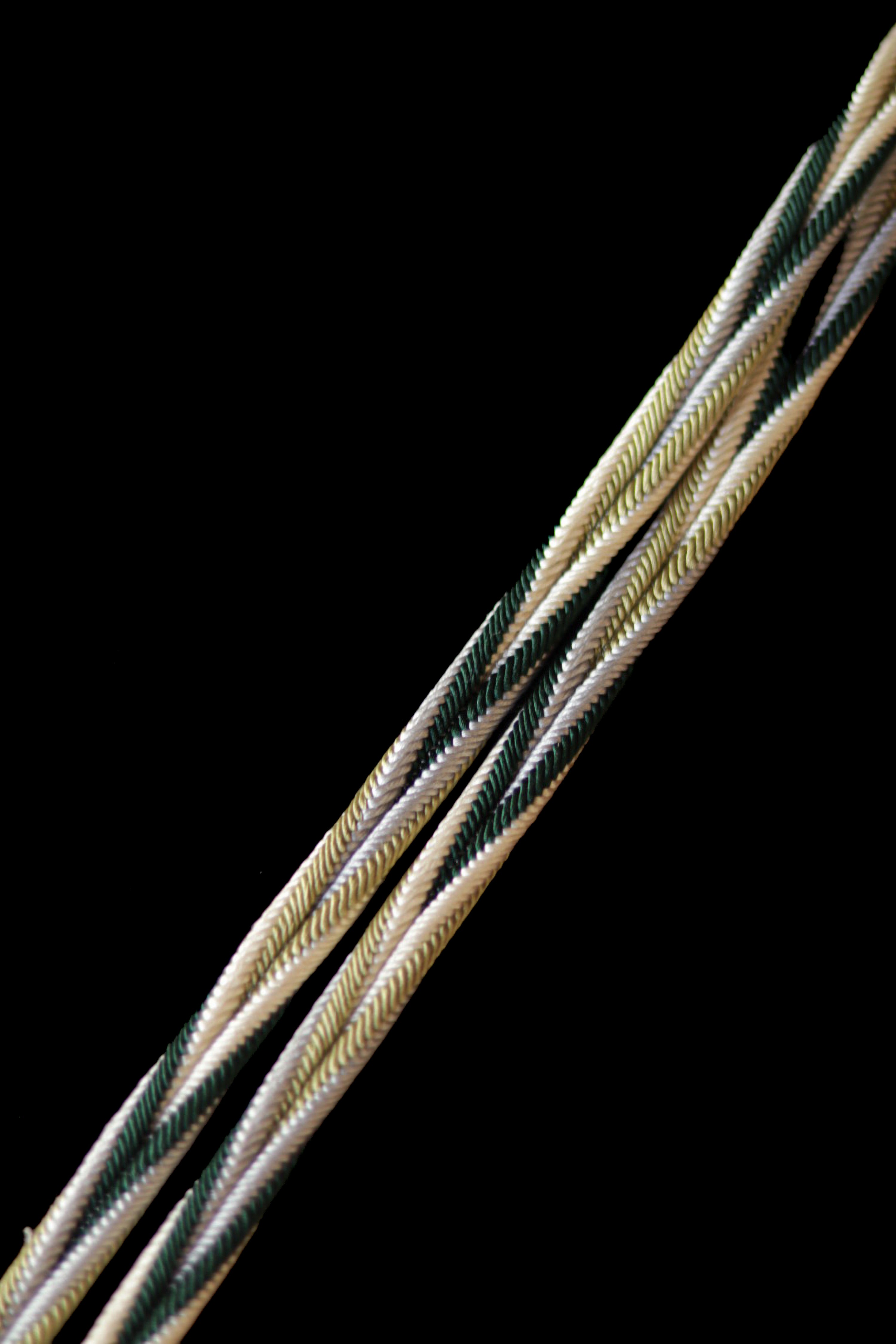 Obijime (sash band) with a twist in four colors, green, yellow, green, and white, by Erihide