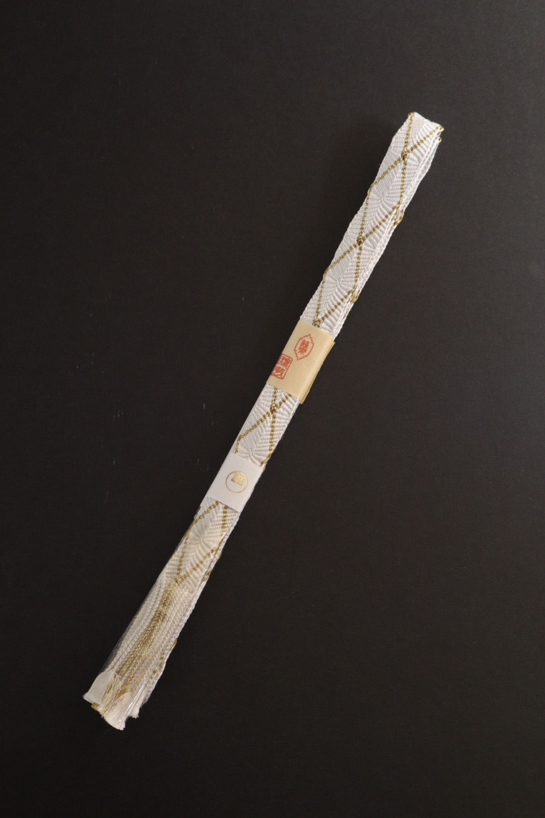 帯締め 唐組ダイヤ柄タコ房 白金（渡敬）